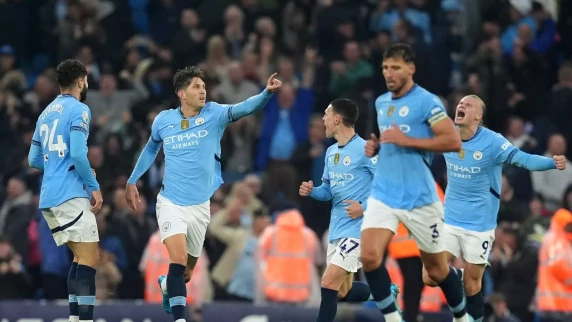 Man City snatch a point against 10-man Arsenal