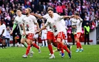joshua-kimmich-of-bayern-munich-and-teammates-celebrate-winning-the-german-championship-19-april-202616.webp