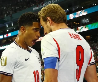 Kane and Bellingham celebrating vs Mexico