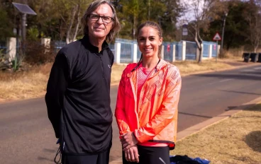 Hennie Kriel (coach), chats to Wenda Nel, one of South Africa’s elite athletes train in the street on Day 106 of the National Lockdown on July 10, 2020 in Pretoria, South Africa