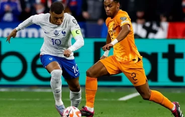 kylian-mbappe-of-france-and-jurrien-timber-of-the-netherlands-24-march