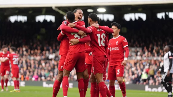 Liverpool down Fulham to move level on points at top of the table with Arsenal