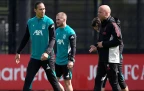 liverpool-s-virgil-van-dijk-and-manager-arne-slot-during-a-training-session-13-april-202616.webp