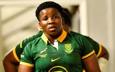 Lusanda Dumke of South Africa leads the team out during the WXV 2 match between South Africa and Australia at Athlone Stadium on October 05, 2024 in Cape Town, South Africa.