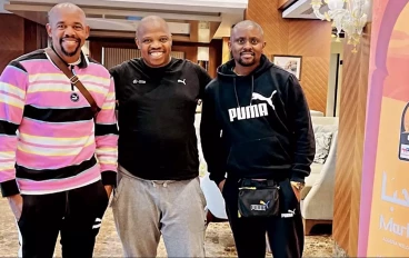 Mamelodi Sundowns scouts Esrom Nyandoro (left) and Tera Maliwa (right), alongside SABC Sport's Velile Mnyandu (centre)