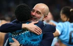 manchester-city-manager-pep-guardiola-celebrates-with-savinho-22-march-202616.webp