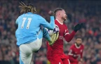 manchester-city-s-jeremy-doku-and-liverpool-s-alexis-mac-allister-fight-for-the-ball16.webp