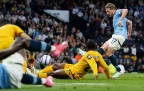 manchester-city-s-kevin-de-bruyne-scores-against-wolves16.webp
