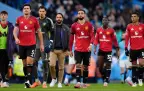 manchester-united-s-bruno-fernandes-(centre)-appears-dejected-14-setember-202516.webp