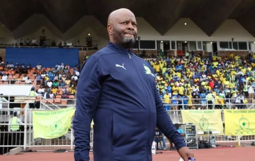 Manqoba Mngqithi head coach of Mamelodi Sundowns walk out prior to the Betway Premiership match between Polokwane City and Mamelodi Sundowns at Old Peter Mokaba Stadium on October 27, 2024 in