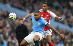 manuel-akanji-tussles-with-jurien-timber-arsenal-city-sept-22-202416.webp