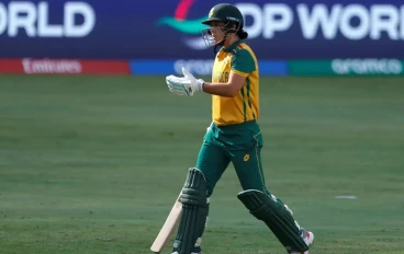 Marizanne Kapp of South Africa makes their way off after being dismissed during the ICC Women's T20 World Cup match between South Africa and Scotland at Dubai International Cricket Stadium on