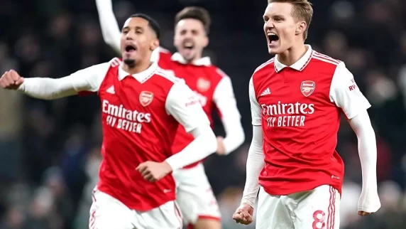 Arsenal extend Premier League lead to eight points with win at Tottenham