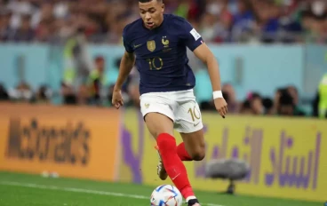 Kylian Mbappe of France controls the ball during the FIFA World Cup Qatar 2022 Round of 16 match between France and Poland.