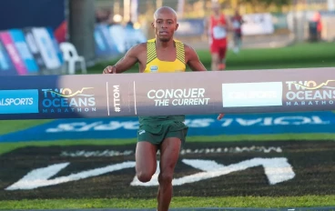 Mbuleli Mthanga wins the Half Marathon during the 2023 Totalsports Two Oceans Half Marathon finishing at UCT Rugby Fields on April 16, 2023 in Cape Town, South Africa.