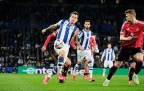 mikel-oyarzabal-of-real-sociedad-trying-to-control-the-ball-in-front-of-matthijs-de-ligt16.webp