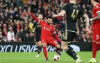 mohamed-salah-of-liverpool-shoots-and-scores16.webp
