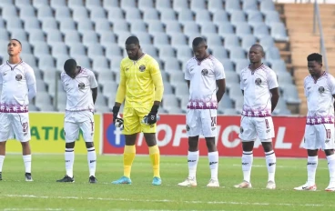 Teams observe a moment of silence during the DStv Premiership match between Moroka Swallows and Chippa United at Dobsonville Stadium on October 04, 2023 in Johannesburg, South Africa.