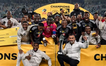 Orlando Pirates celebrate winning during the MTN8 final match between Orlando Pirates and Mamelodi Sundowns at Moses Mabhida Stadium on October 07, 2023 in Durban, South Africa. (Photo by Dar