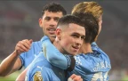 phil-foden-celebrates-scoring-man-city-s-second-goal-with-bernardo-silva16.webp