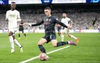 phil-foden-of-manchester-city-shoots16.webp