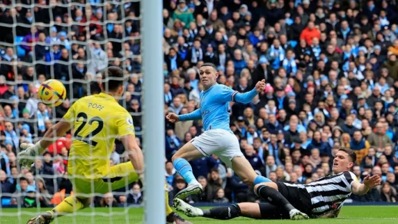 Manchester City keep pressure on Arsenal with win over Newcastle