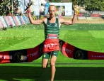 Piet Wiersma wins the mens 2024 Comrades Marathon race during the Comrades Marathon finishing at Hollywoodbets Scottsville Racecourse on June 09, 2024 in Pietermaritzburg, South Africa.