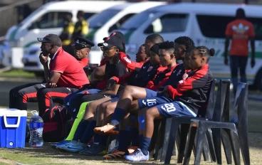 Richmond United Ladies bench with coach Edwin Lisene