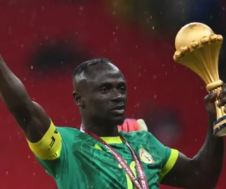 Sadio Mane with AFCON trophy