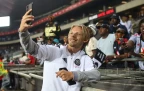 sebastian-pedersen-snapping-photos-with-pirates-fans.webp