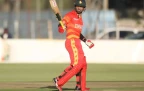 sikandar-raza-raising-his-bat-jpg.webp