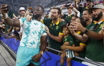 Springbok captain Siya Kolisi with fans