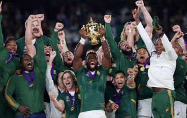Siya Kolisi (centre) lifts the trophy as South Africa win the 2019 Rugby World Cup final
