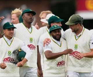 south-africa-s-captain-temba-bavuma-center-right-celebrates-with-teammates-22-october-202616