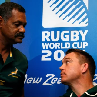 South Africa's captain John Smit, right, chats with coach Peter De Villiers, left