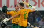 south-africas-david-miller-right-celebrates-with-batting-partner-quinton-de-kock-1.webp