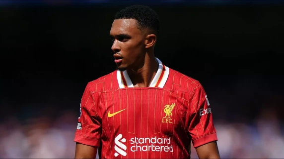 Liverpool's Arne Slot shrugs off Trent Alexander-Arnold's substitution reaction