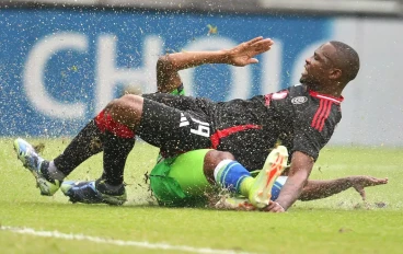 Tshegofatso Mabasa of Orlando Pirates and Trevor Mathiane of Marumo Gallants FC during the Betway Premiership match between Orlando Pirates and Marumo Gallants FC at Orlando Stadium on Decemb