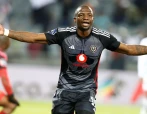 Tshegofatso Mabasa of Orlando Pirates scores his goal against Sifiso Mlungwana of Golden Arrows during the DStv Premiership match between Orlando Pirates and Golden Arrows at Orlando Stadium 