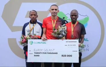 2019 Two Oceans Half-Marathon podium: Elroy Gelant (C), Jobo Khatoane (L), Stephen Mokoka (R)