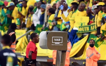 CAF referee during a VAR review