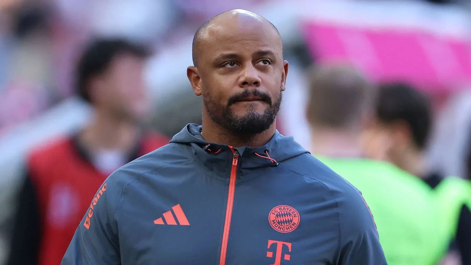 Vincent Kompany in a Bayern Munich training jacket looking on from the touchline
