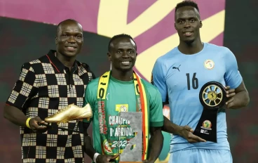 Vincent Aboubakar of Cameroon (Top Goalscorer Award), Sadio Mane of Senegal (Player of the Tournament) and Senegal goalkeeper Edouard Mendy (Goalkeeper of the Tournament with their awards aft