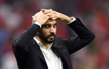 Walid Regragui, Head Coach of Morocco, reacts during the FIFA World Cup Qatar 2022 semi final match between France and Morocco at Al Bayt Stadium